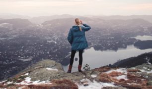 Girl-Looking-at-town-winter